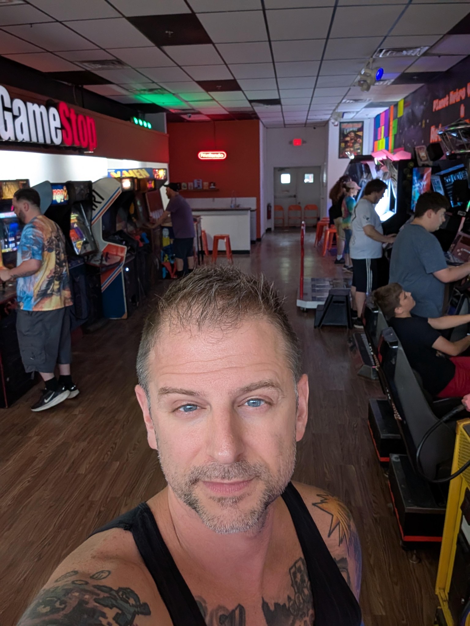 Inside Retroware Arcade with guests enjoying the machines